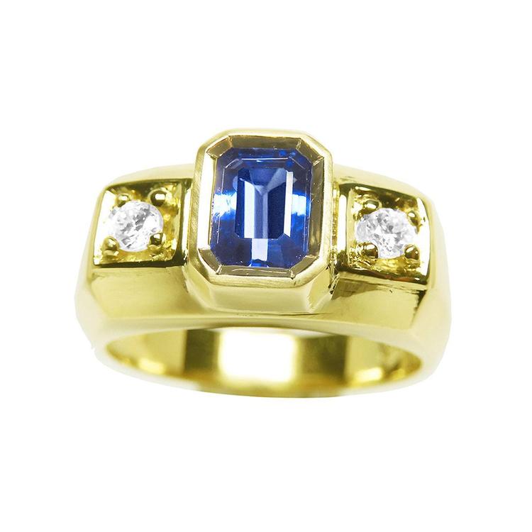 Natural sapphire ring for men bezel set side round cut diamonds 14K yellow gold, top view, front position