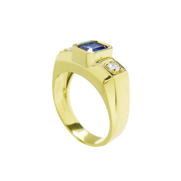 Men's 14K yellow gold ring with an emerald cut blue sapphire and two round side diamonds.