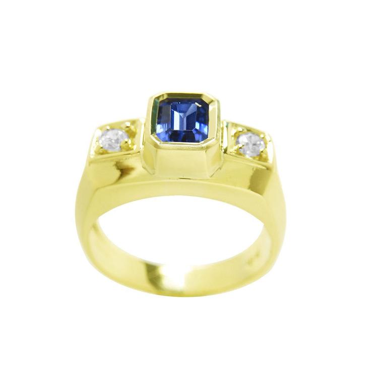 Men's 14K yellow gold ring with emerald cut blue sapphire and two round side diamonds.
