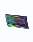 Front position of a loose Brazilian watermelon tourmaline bicolor red orange and green bluish, table and crown visibles