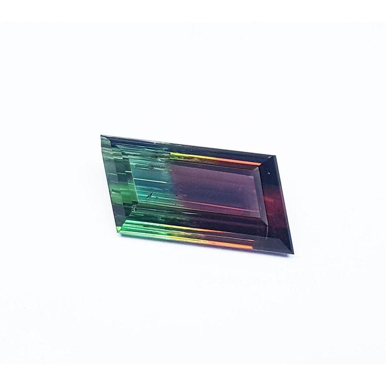 Loose Brazilian watermelon tourmaline bicolor red orange and green bluish.