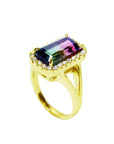 This real watermelon tourmaline ring in yellow gold is on a half side position where the top and split shank are visibles.
