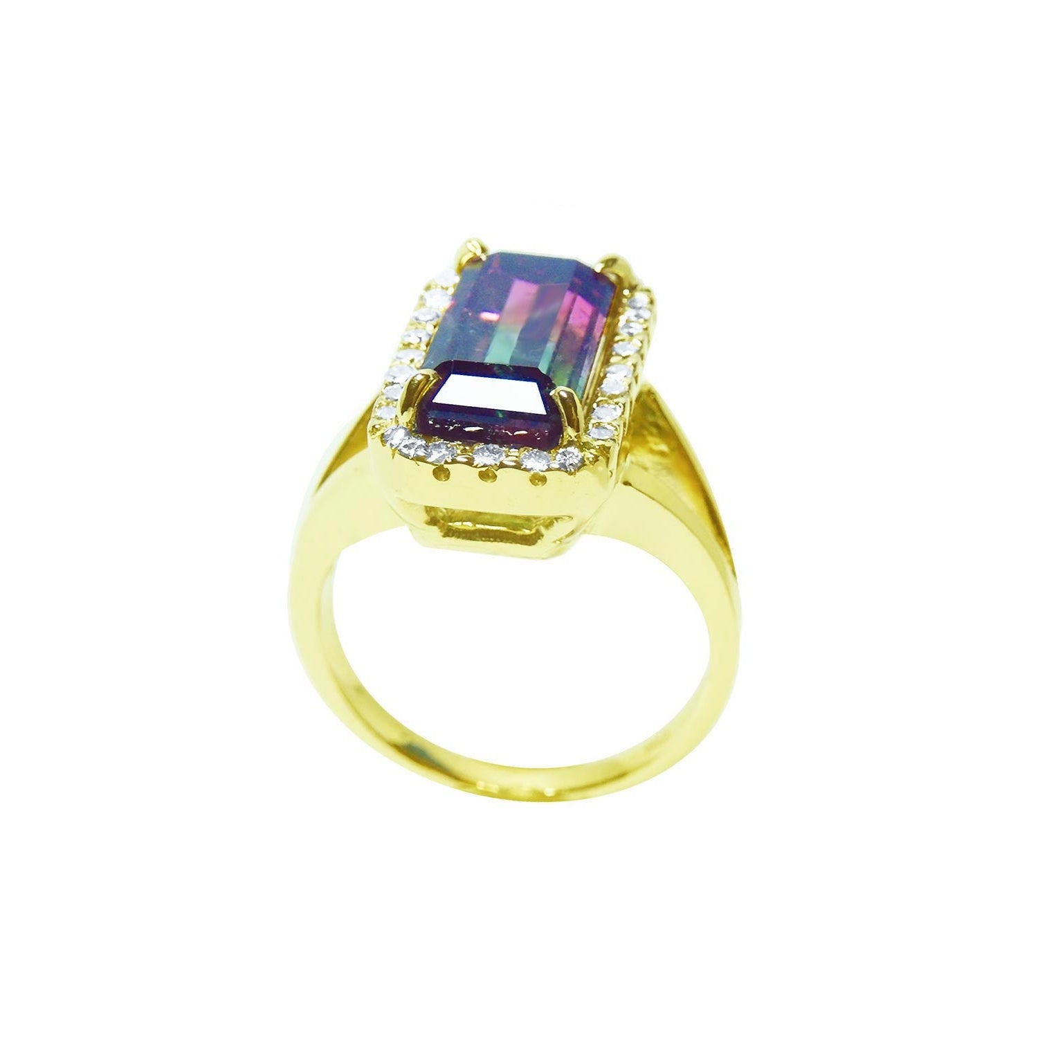 This natural watermelon tourmaline ring with a halo diamond, crafted in 14k yellow gold, is on a lateral profile view.