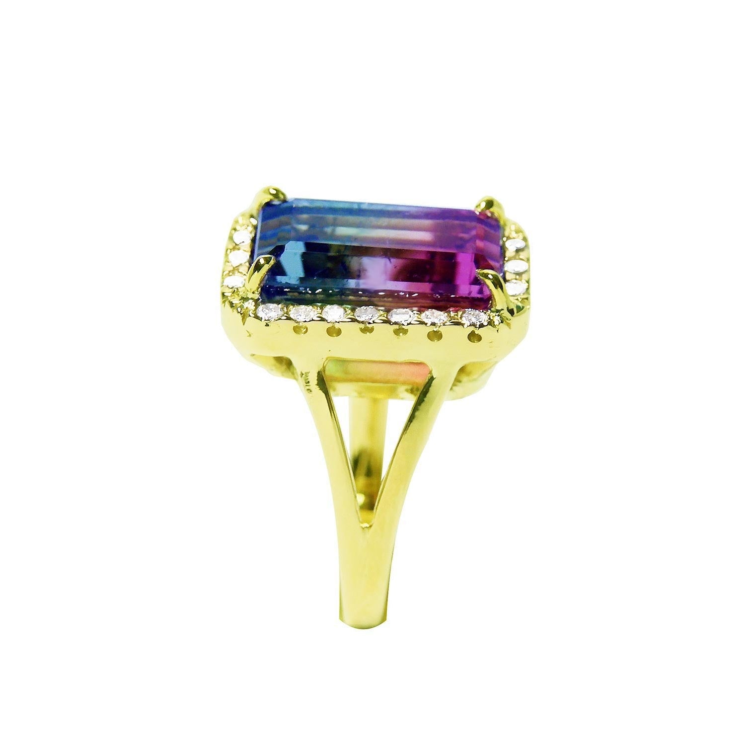 The pink and green of this tourmaline ring are visibles fron the top to side down split shank profile.