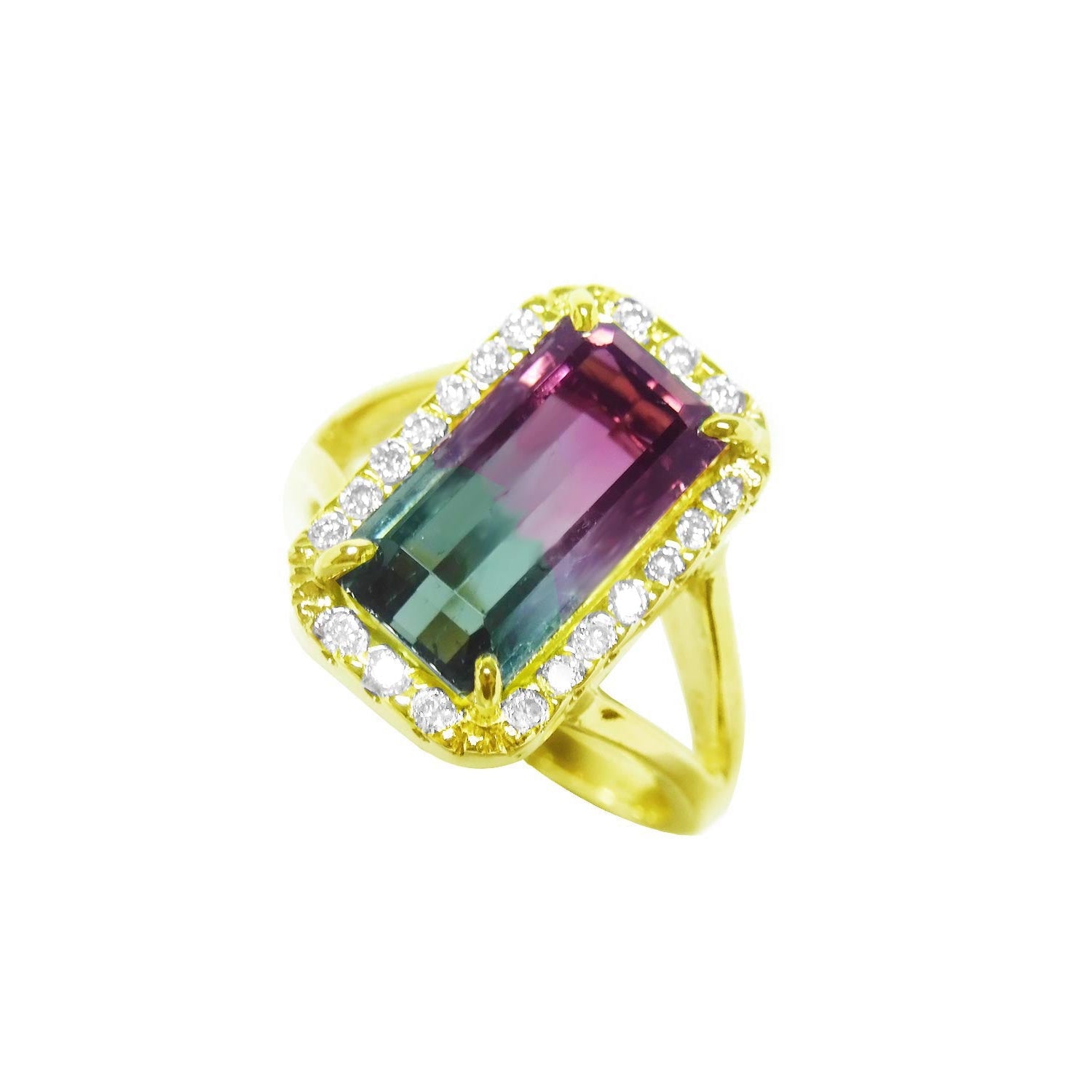 A natural watermelon tourmaline ring with a halo diamond, crafted in 14k yellow gold, tilted left side position top view.