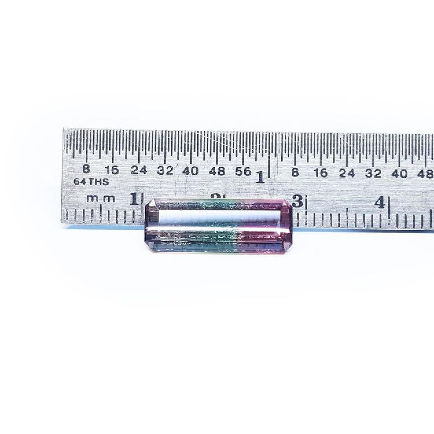 Rectangular bicolor Brazilian watermelon tourmaline, pink, green, and soft pink, shown with a ruler.