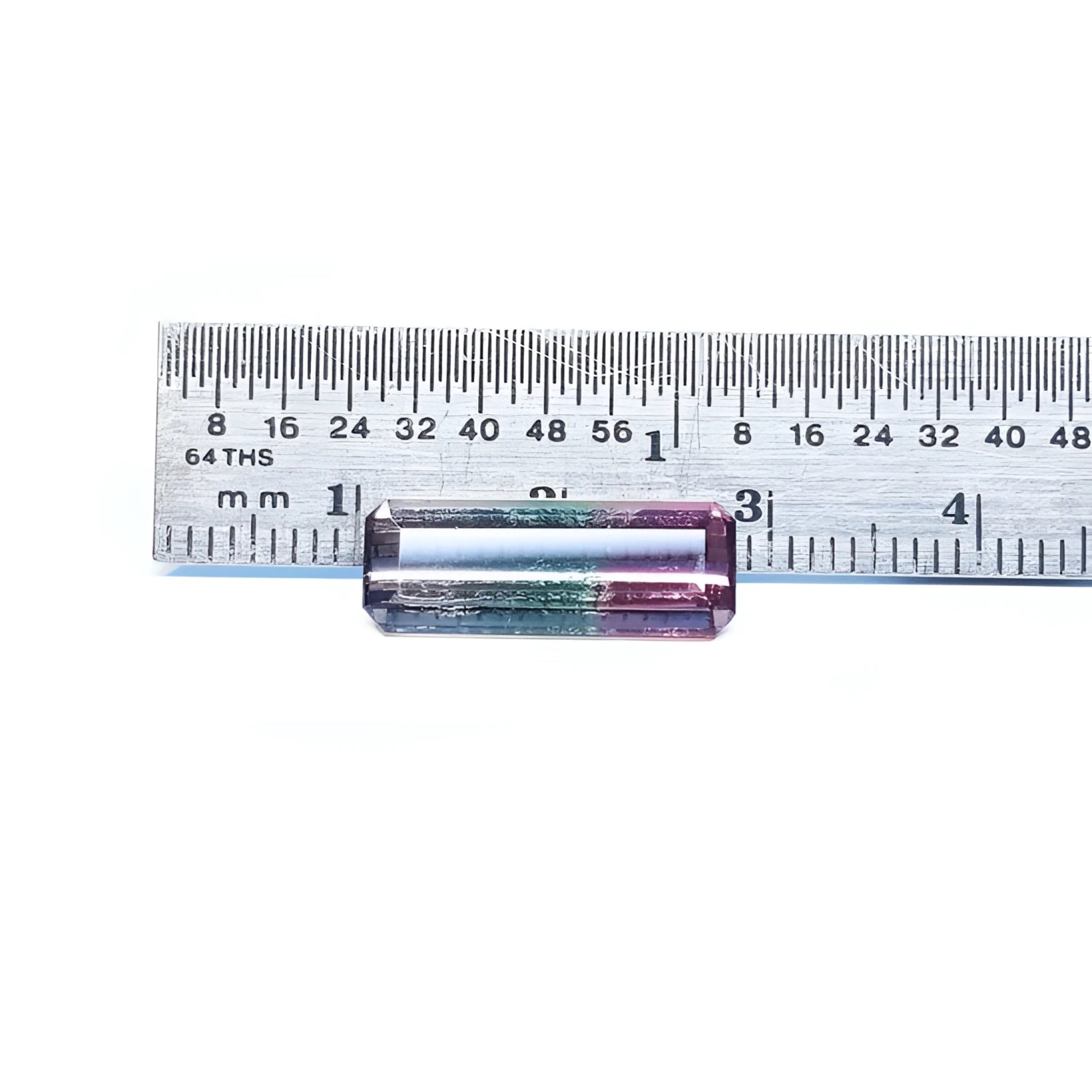 Rectangular bicolor Brazilian watermelon tourmaline, pink, green, and soft pink, shown with a ruler.