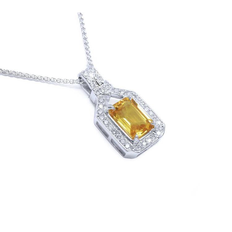 On its right-side side top view of a natural yellow sapphire pendant necklace halo diamond 18k white gold