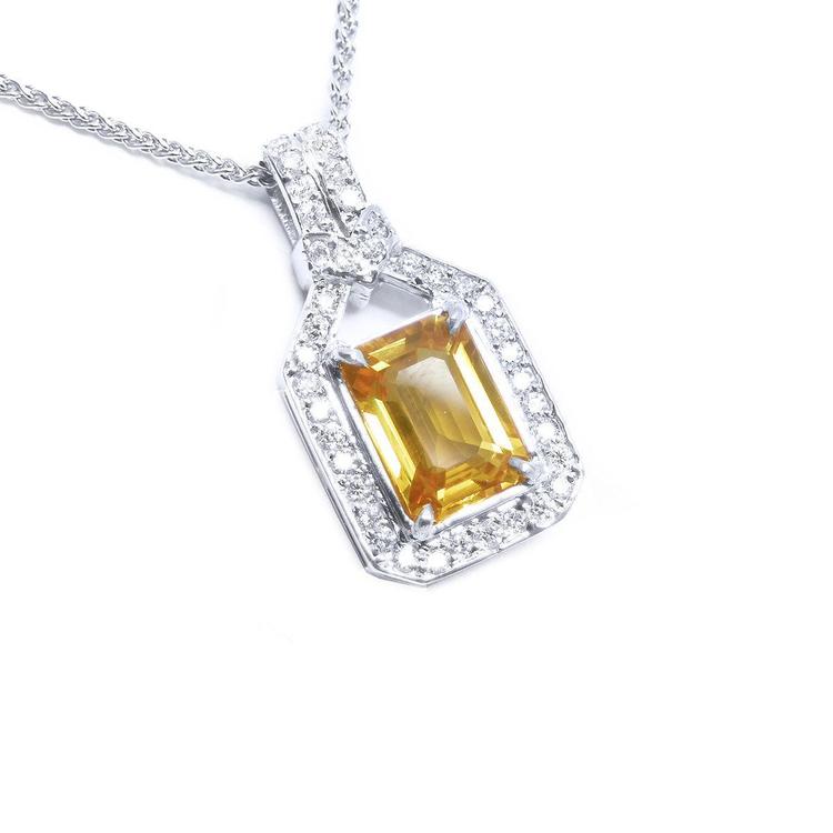 Right side top view of a natural yellow sapphire pendant necklace halo diamond 18k white gold