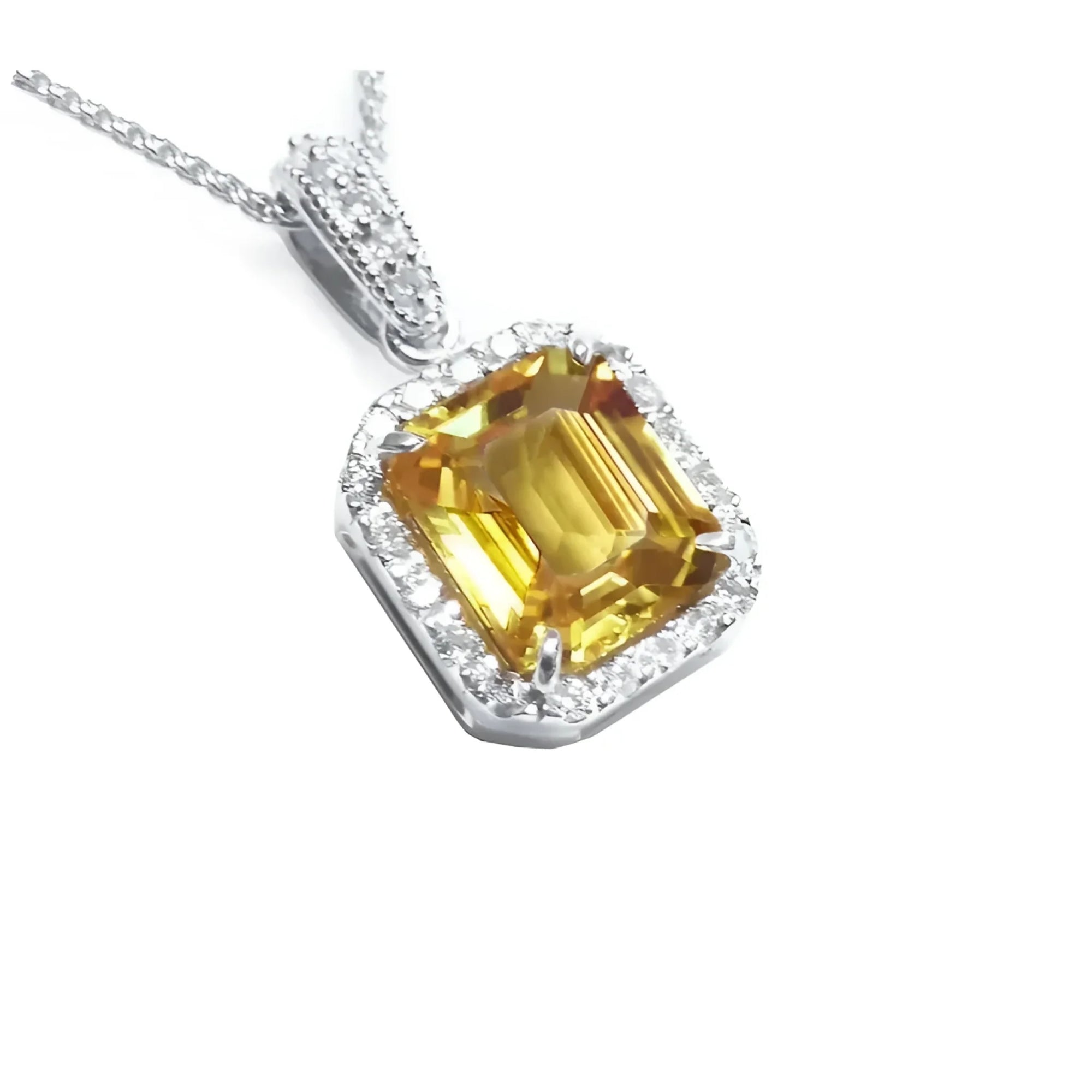 Natural yellow sapphire pendant halo diamonds handcrafted in 18k white gold.