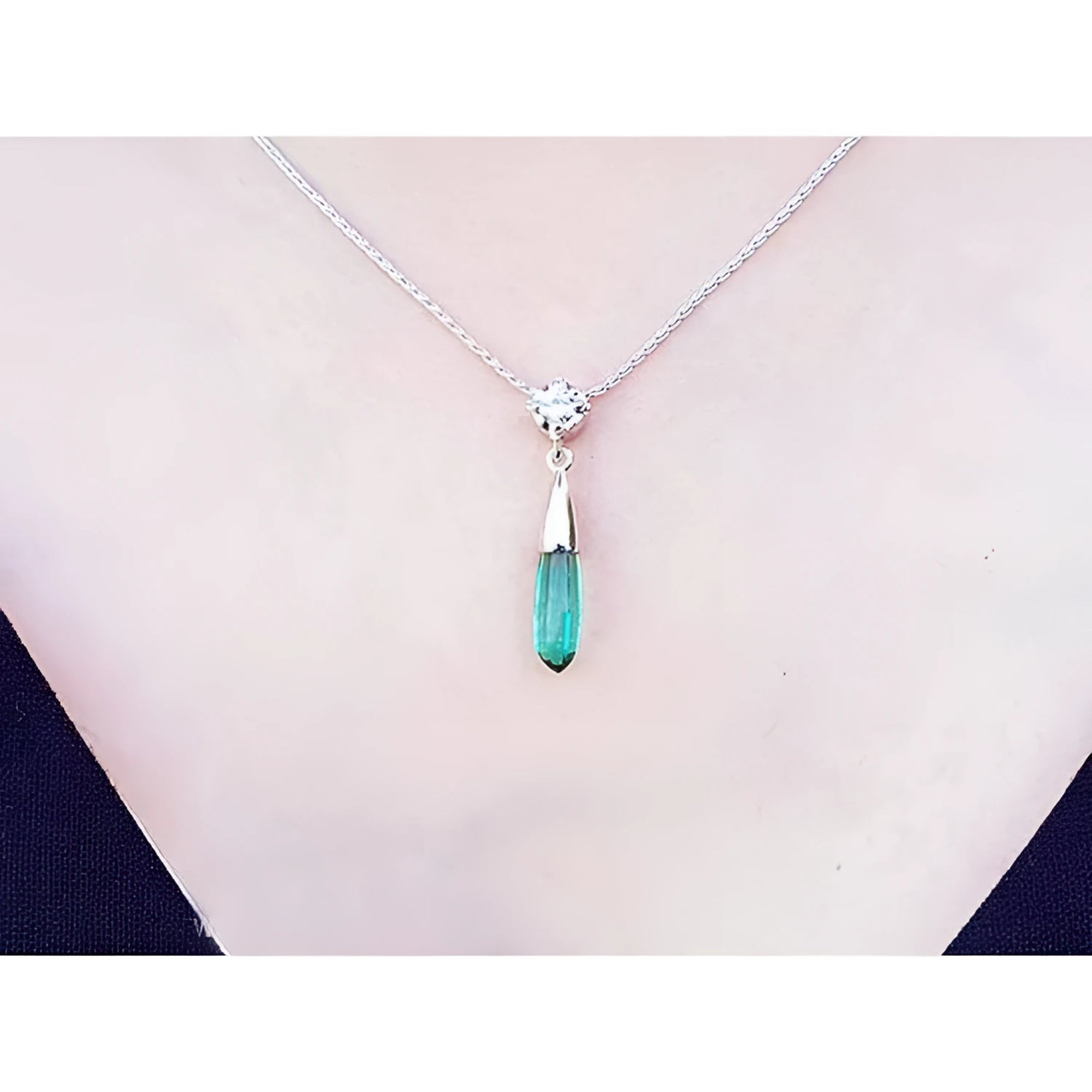 Colombian emerald briolette necklace with a diamond slider on a 14K white gold chain.