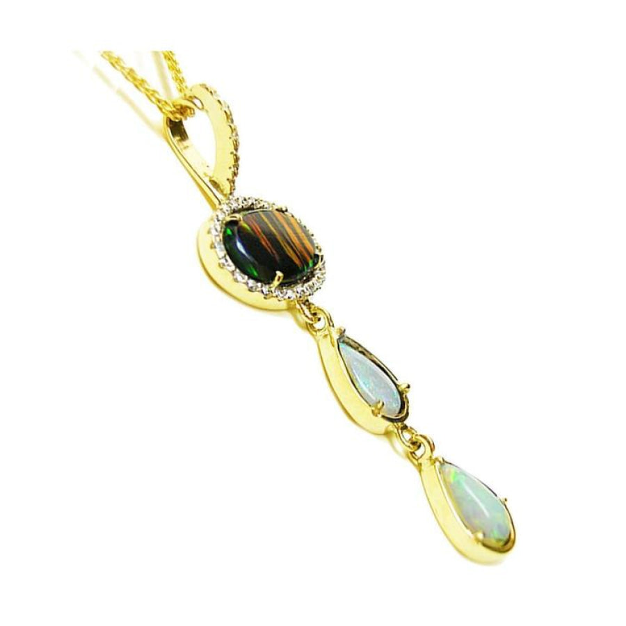 Black and white Australian opal pendant in 14K yellow gold with diamonds, featuring an oval and two pear-shaped opals.