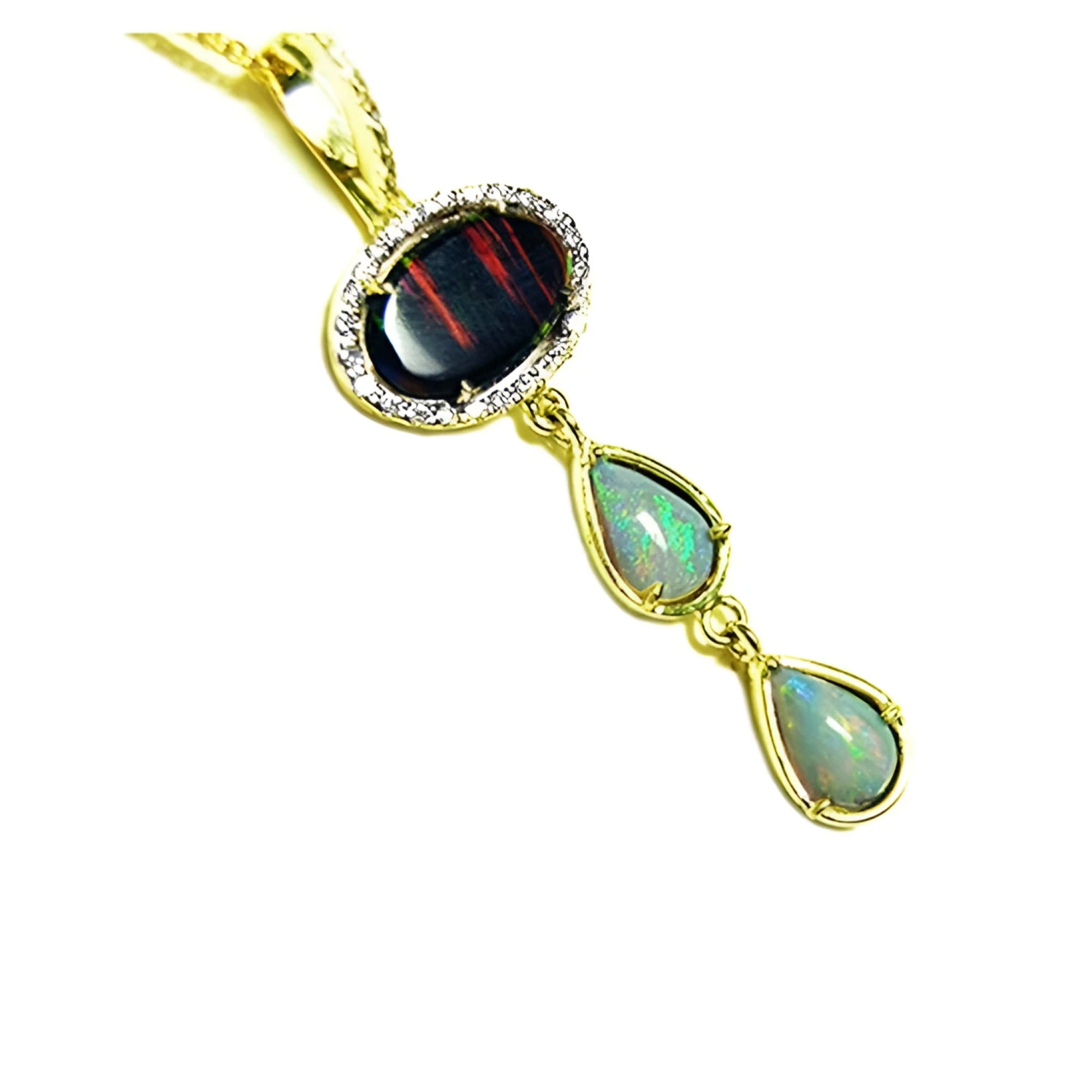 Black and white Australian opal pendant in 14K yellow gold with diamond halo and two dangling teardrop opals.