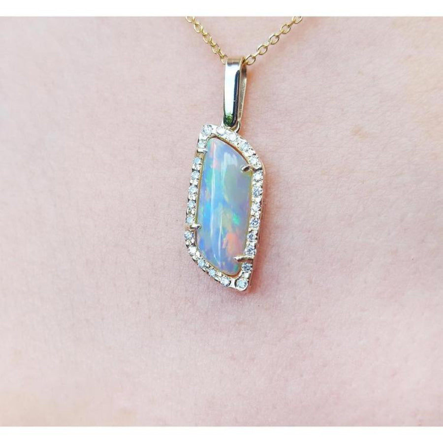 14K yellow gold opal and diamond pendant necklace with a colorful Australian opal.