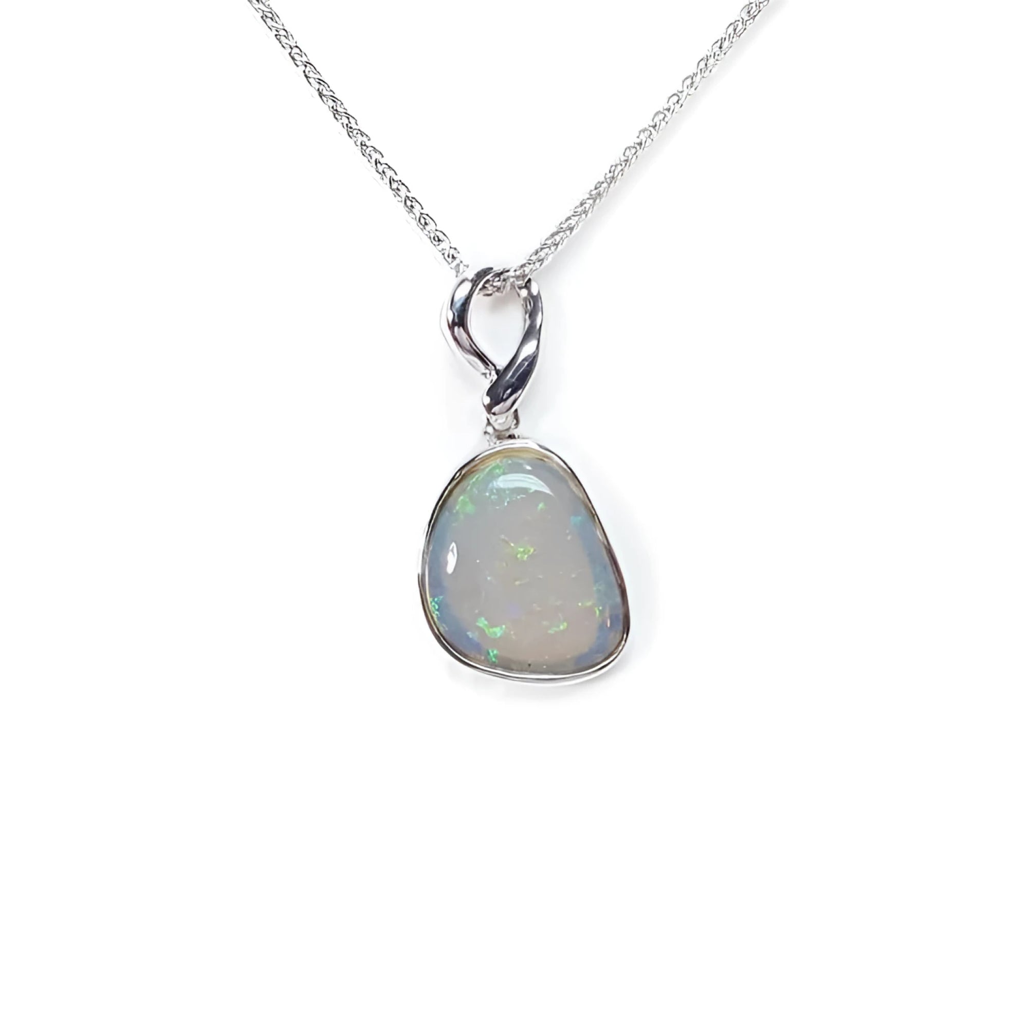 Freeform bluish-green Australian opal pendant, bezel set in 14K white gold on a silver chain.