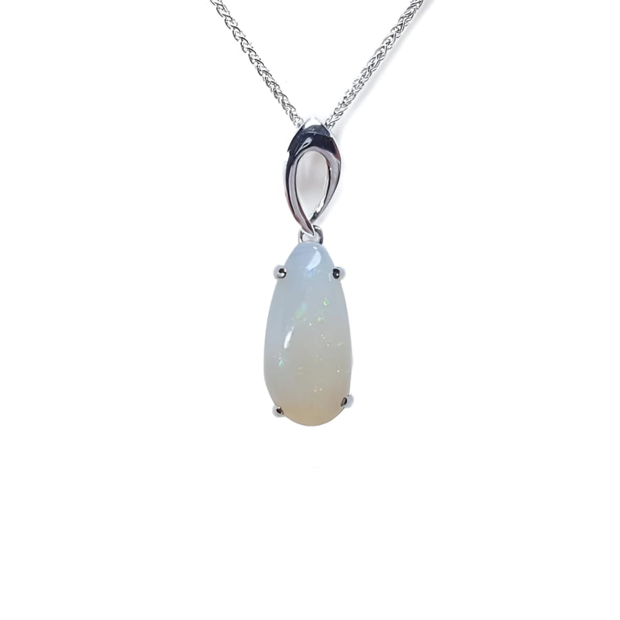 Pear-shaped white opal solitaire pendant in 14K white gold on a delicate chain.