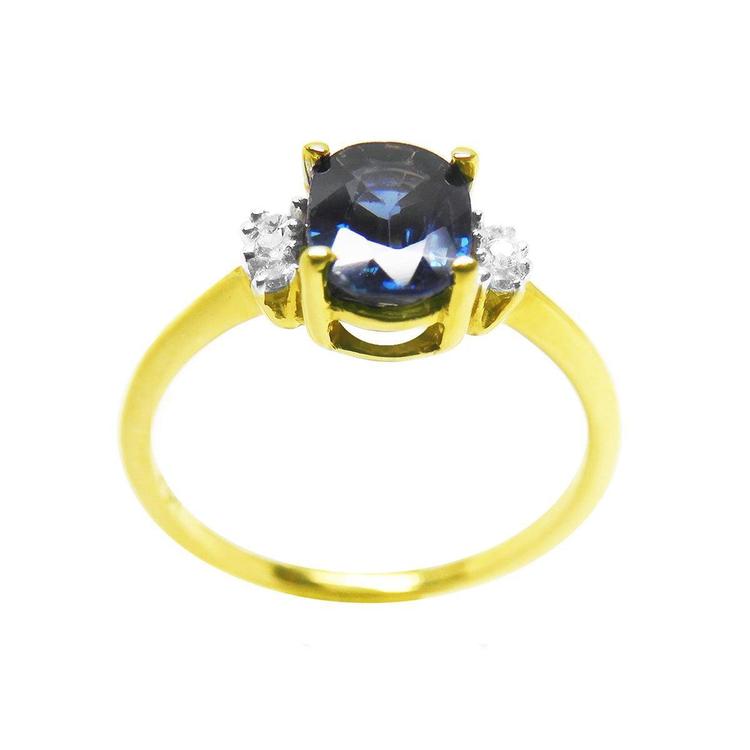 14k yellow gold women's blue sapphire ring 0.87 ct. oval cut, half tall top view