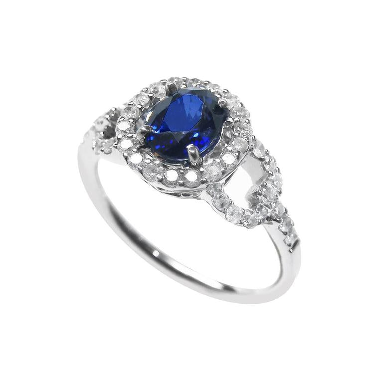 Blue sapphire ring for women September's birthstone Halo Diamonds 14K White Gold, tilted top view down profile