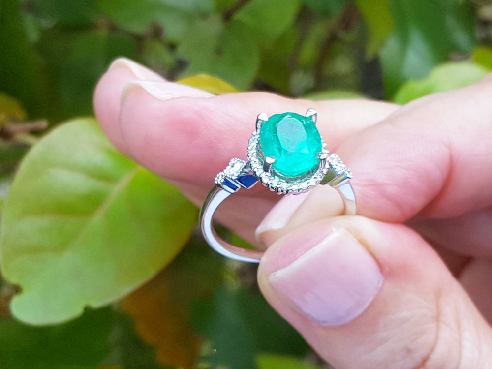 For her in birthday oval cut natural Colombian emerald medium deep green color 2.02 carats halo natural diamonds crafted in 14k white gold