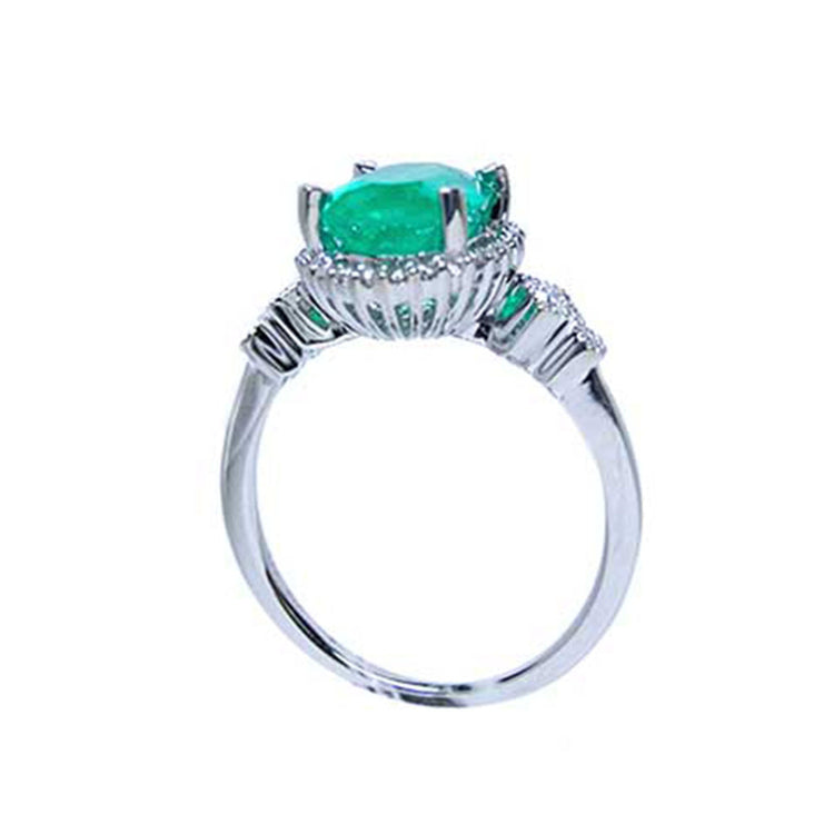 Muzo Colombian emerald oval cut women&#39;s ring medium deep green color 2.02 carats halo natural diamonds crafted in 14k white gold