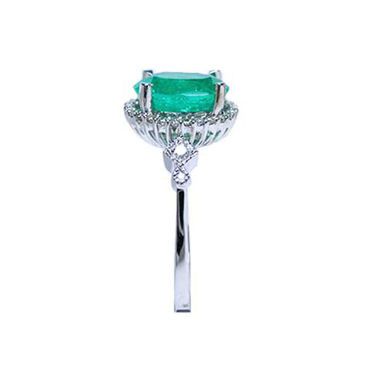 White gold prong set oval cut natural emerald ring medium deep green color 2.02 carats halo natural diamonds crafted in 14k white gold
