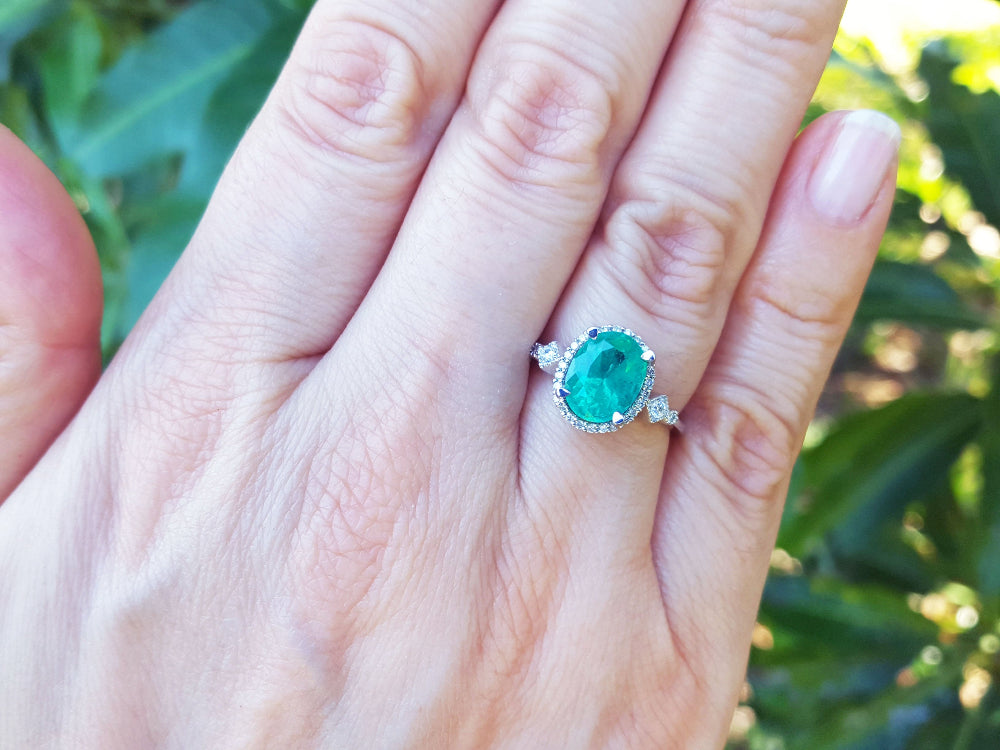 Bride&#39;s May birthstone emerald engagement ring medium deep green color 2.02 carats halo natural diamonds crafted in 14k white gold