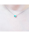 Bridal's oval cut emerald necklace east west orientation halo natural diamonds prong set crafted in 14k white gold 
