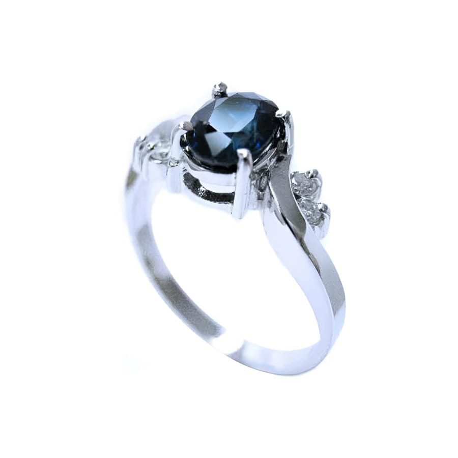 14K white gold ring with a sparkling deep blue oval-cut sapphire and accent diamonds.