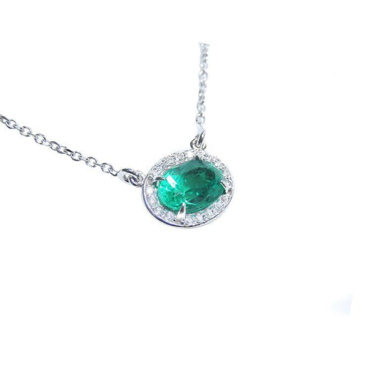 Oval cut emerald necklace east west orientation halo natural diamonds prong set crafted in 14k white gold