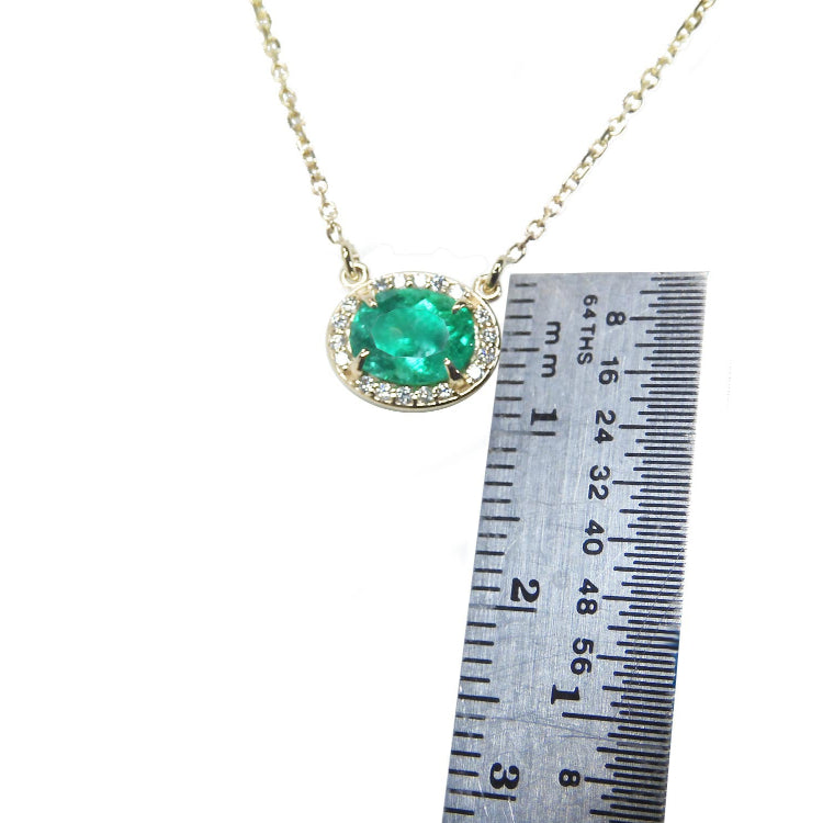 Real Emerald necklaces for sale oval cut from Muzo mines Colombia halo natural diamonds, crafted in 14k yellow gold