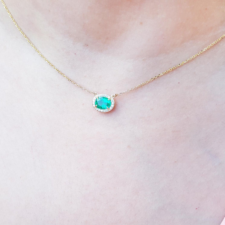 Oval cut east wes orientation Emerald necklaces from Muzo mines Colombia halo natural diamonds, crafted in 14k yellow gold