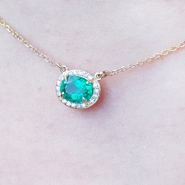 Yellow gold Emerald necklace for women from Muzo mines Colombia halo natural diamonds, crafted in 14k