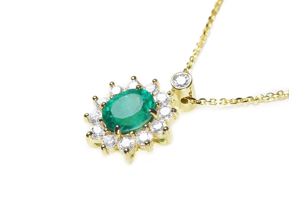 Emerald slider necklace natural Muzo mine oval cut 1.11 carats encircled by halo diamonds crafted in 14k yellow gold