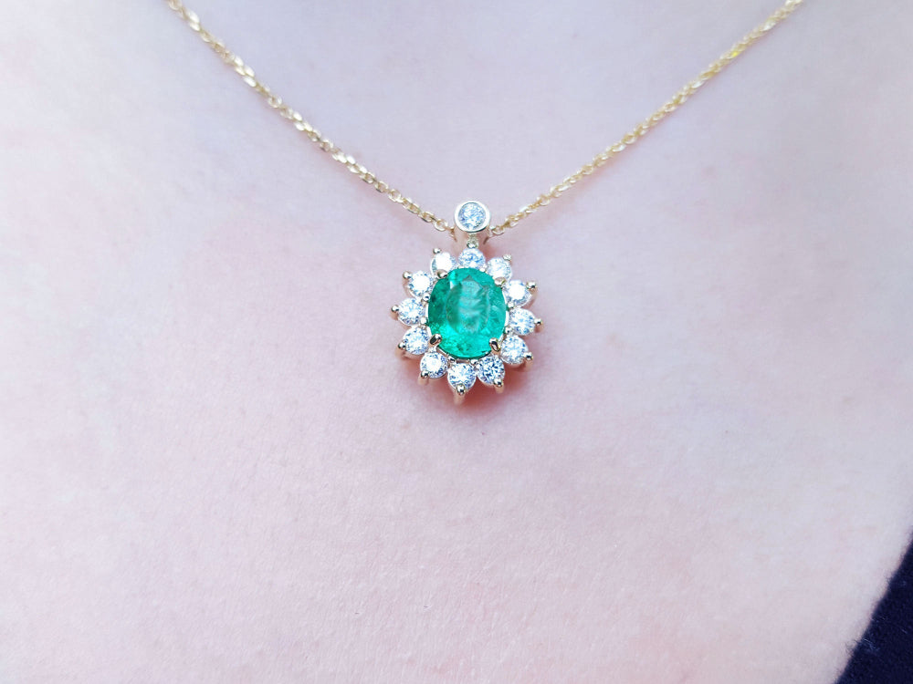 Colombian Emerald necklaces natural Muzo mine oval cut 1.11 carats encircled by halo diamonds crafted in 14k yellow gold