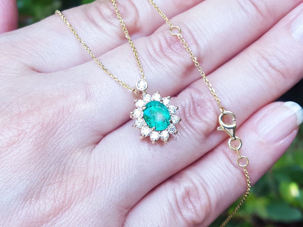 Genuine Colombian Emerald necklaces natural Muzo mine oval cut 1.11 carats encircled by halo diamonds crafted in 14k yellow gold