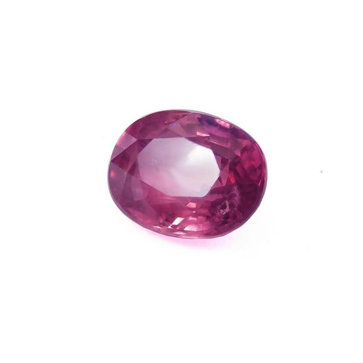 Oval cut loose natural ruby 2.38 ct.  Mozambique, left side table and crown visibles