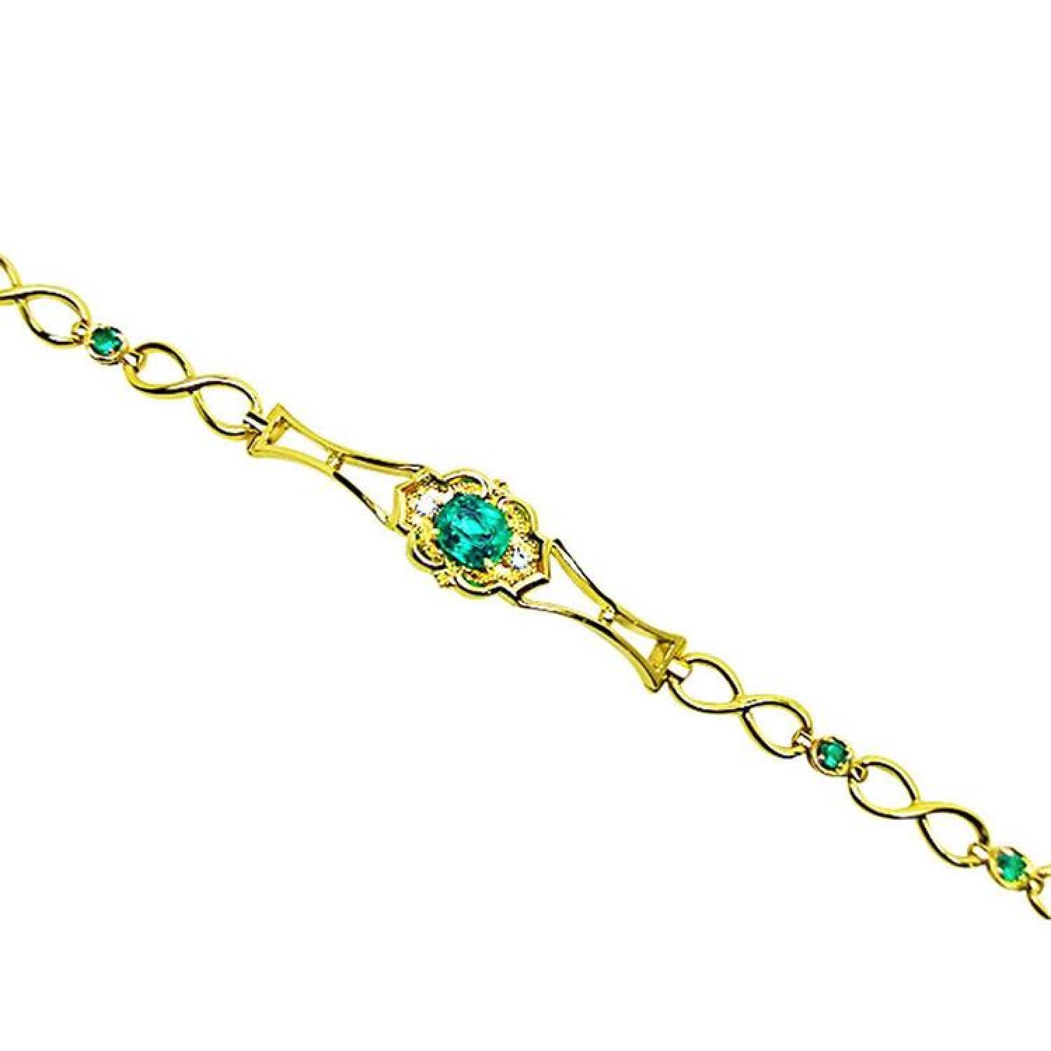 14K yellow gold bracelet with a central oval emerald and small round emerald accents.