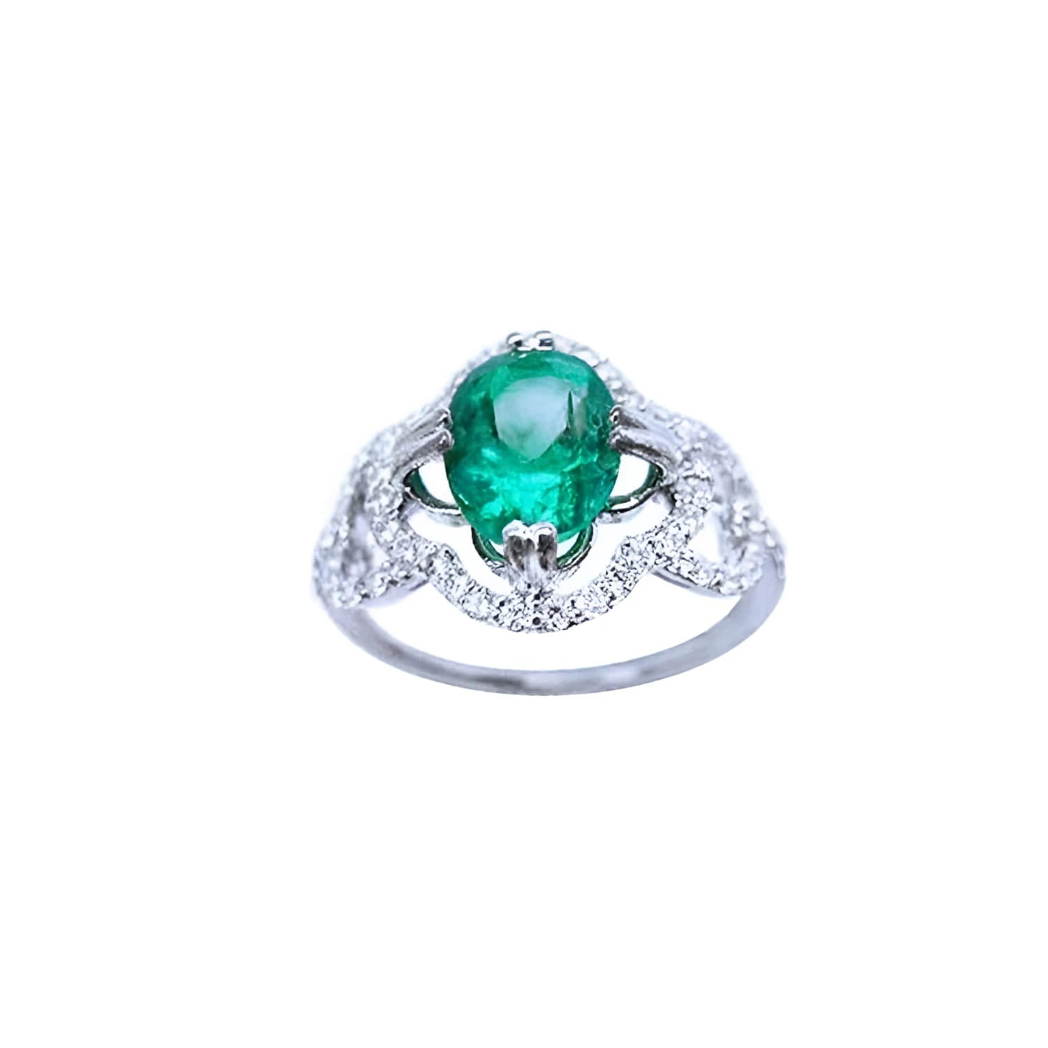 1.55 ct. oval emerald clover ring with diamond halo in 14K white gold.