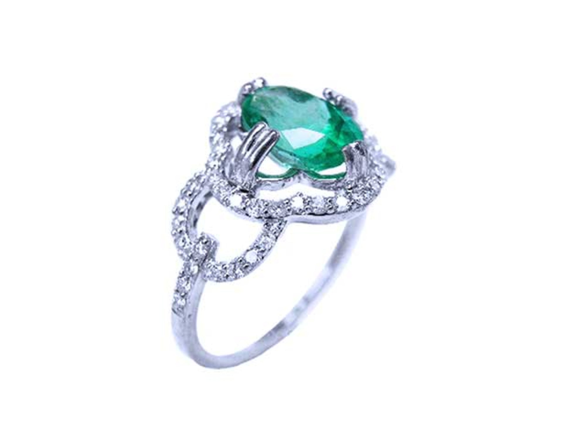 A 14k white gold ring with an oval cut emerald and diamond accents on a white background.