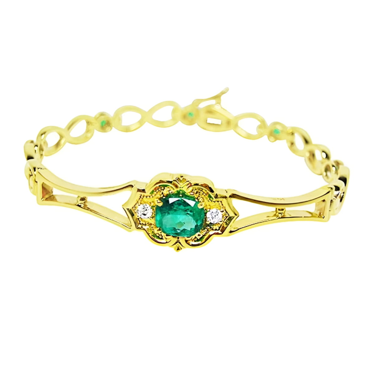 A 14k yellow gold bracelet with a Muzo mine natural colombian emerald oval cut. 