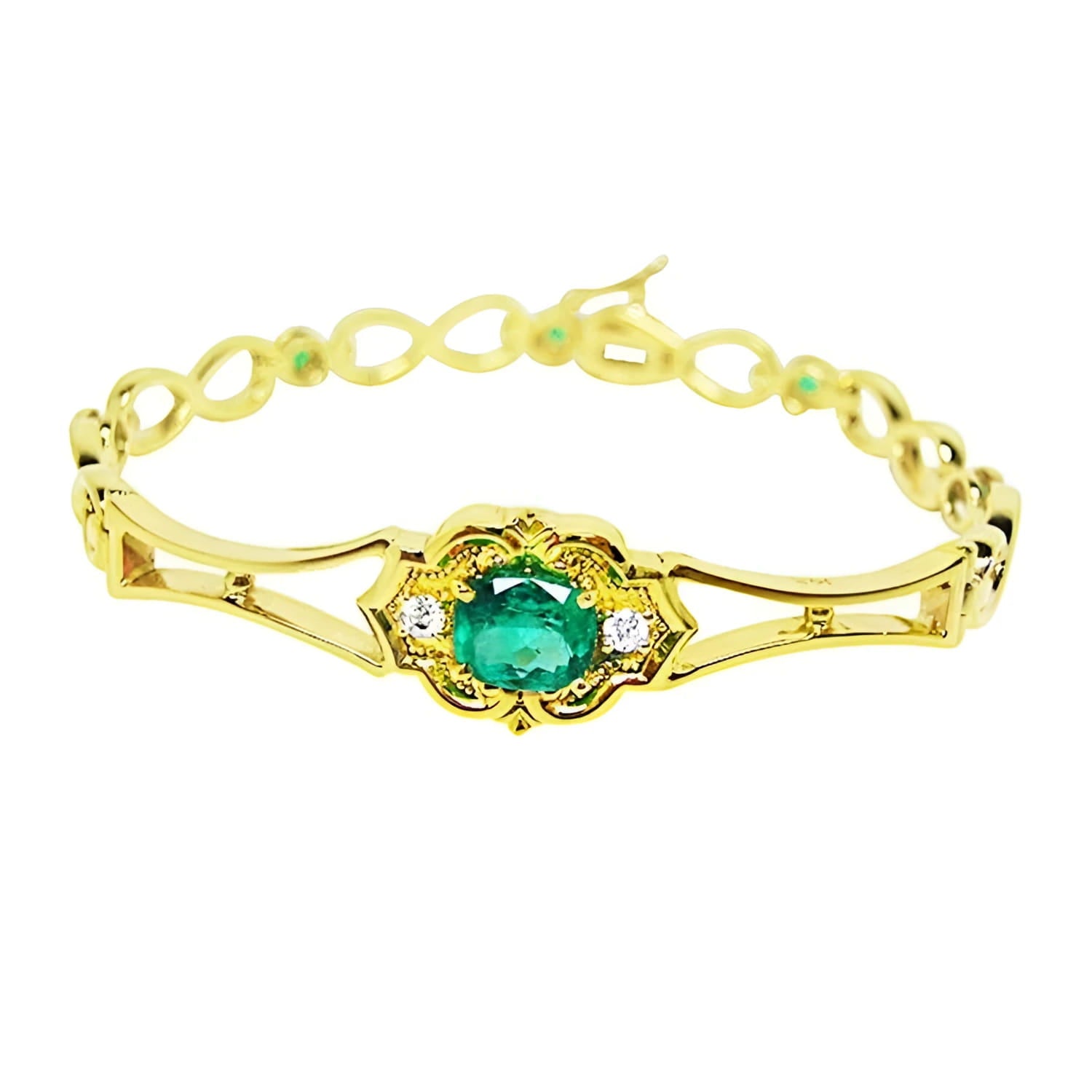 A 14k yellow gold bracelet with a Muzo mine natural colombian emerald oval cut. 