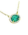Oval cut emerald necklace for women from Muzo mines Colombia halo natural diamonds, in 14k yellow gold