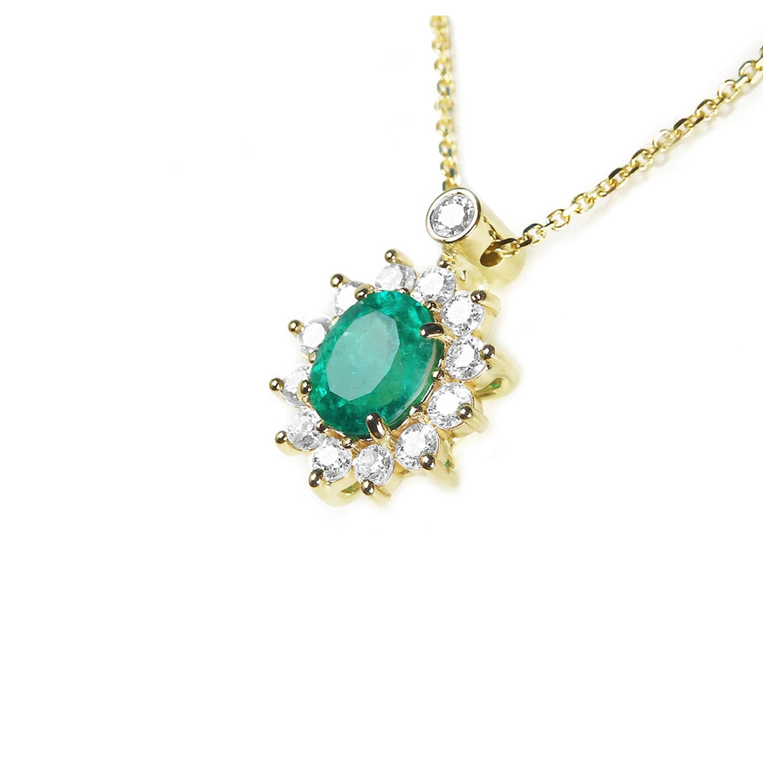 14K yellow gold necklace with oval emerald (1.11 ct) and natural diamond halo pendant.