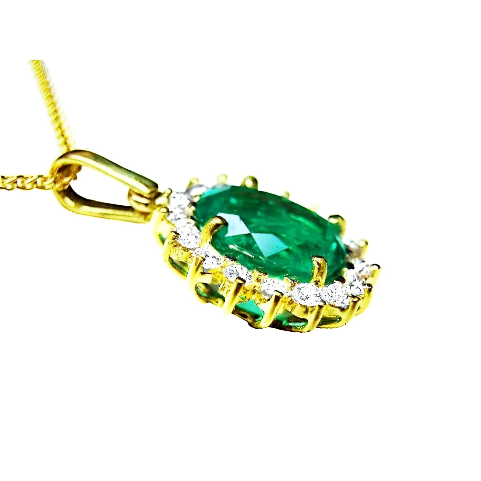 Oval natural emerald pendant with halo diamonds in 18K yellow gold.