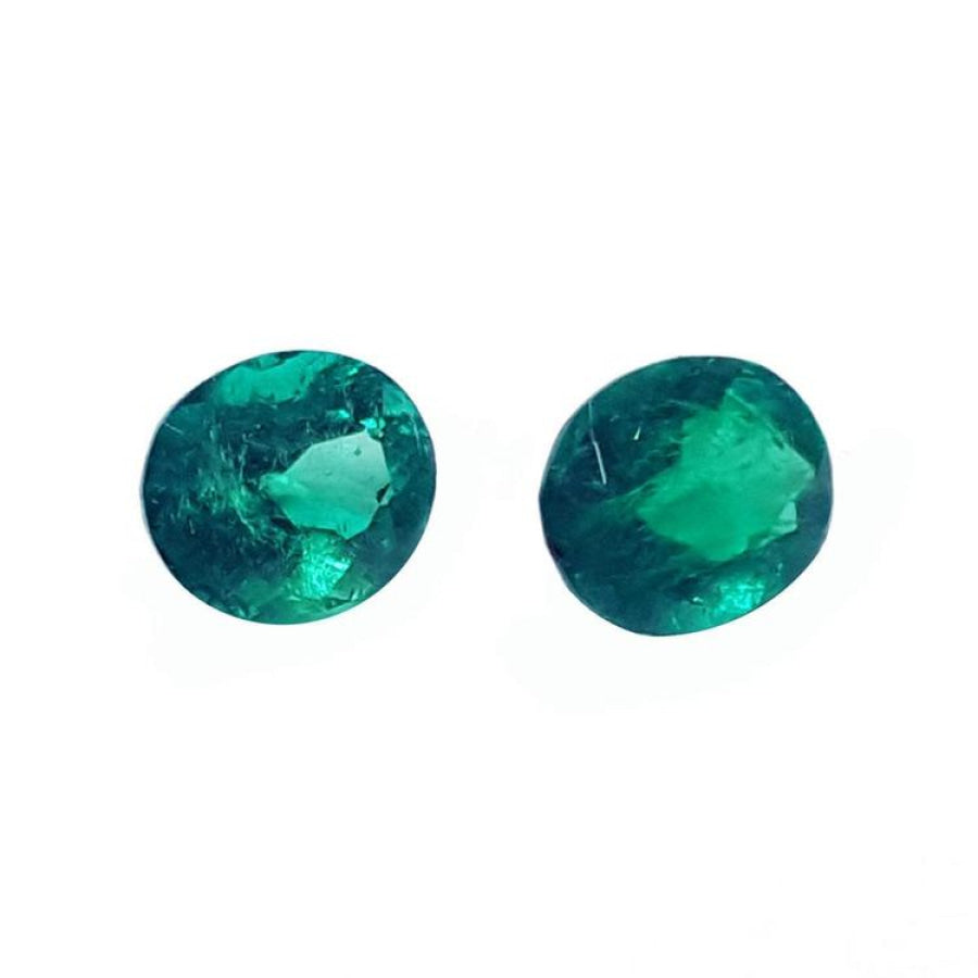 1.60 cttw. oval cut natural loose emeralds matched pair, deep bluish-green hue.
