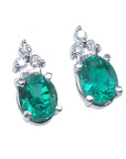Pair of emerald earrings oval cut right side tables and crowns are visibles
