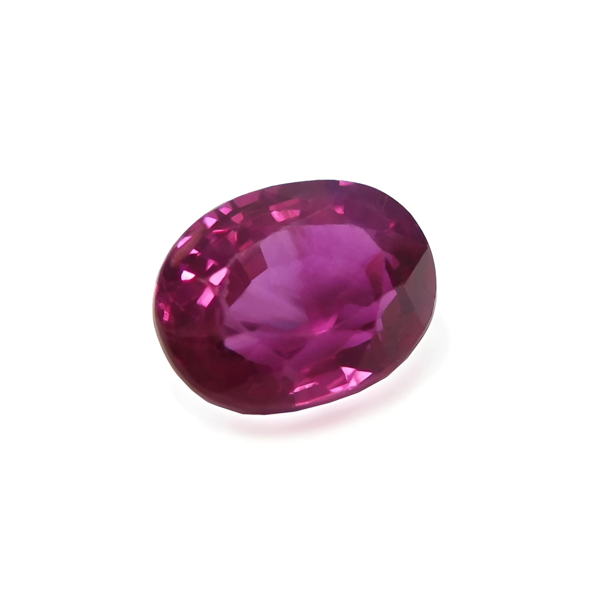 1.31 ct. oval-cut natural Burma ruby gemstone with vivid red and purple hues.