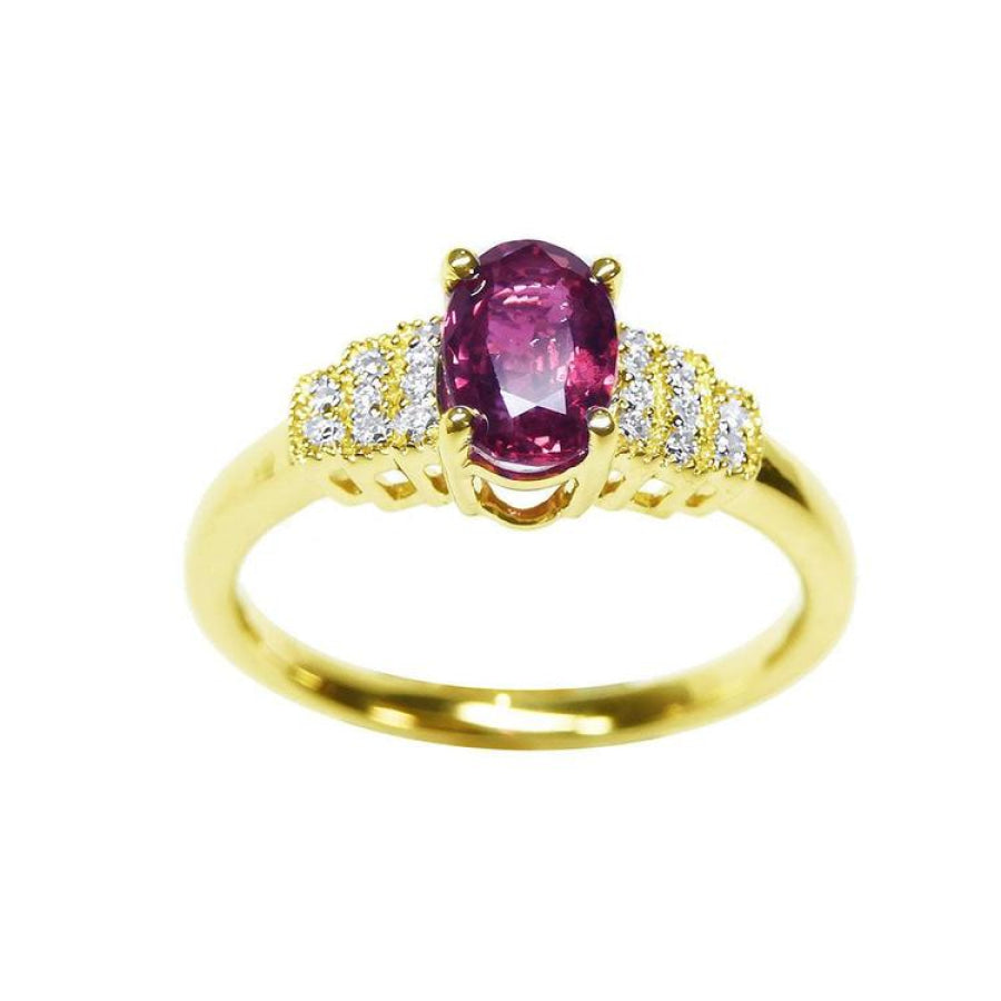 14k yellow gold women's ring with a deep red oval cut ruby and sparkling side diamonds.