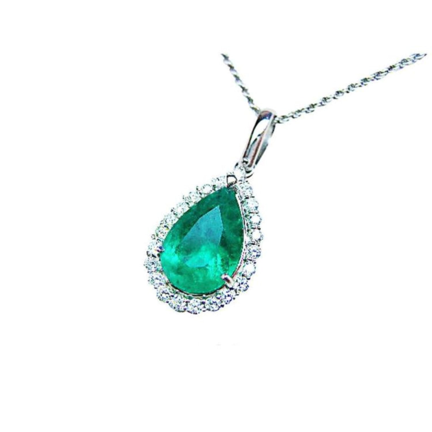18K white gold pear-shaped emerald pendant with a halo of natural diamonds on a chain.