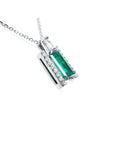 14K white gold emerald and diamond pendant necklace with baguette cut emerald and diamond slider.